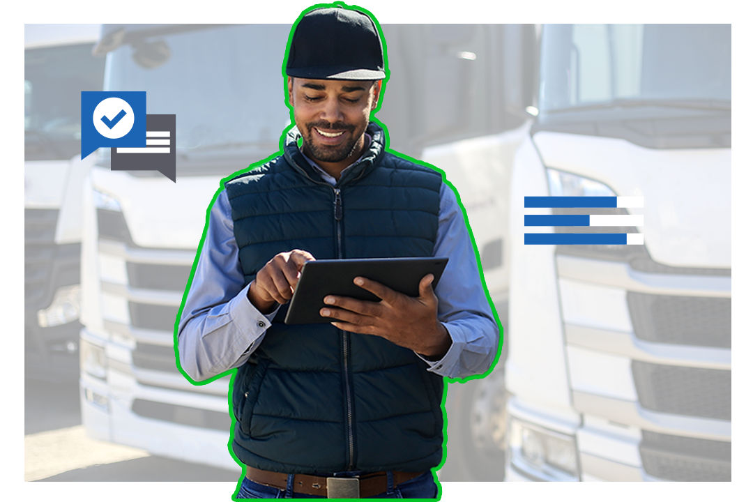 lexmark-iot-man-standing-in-front-of-trucks-with-tablet-240329