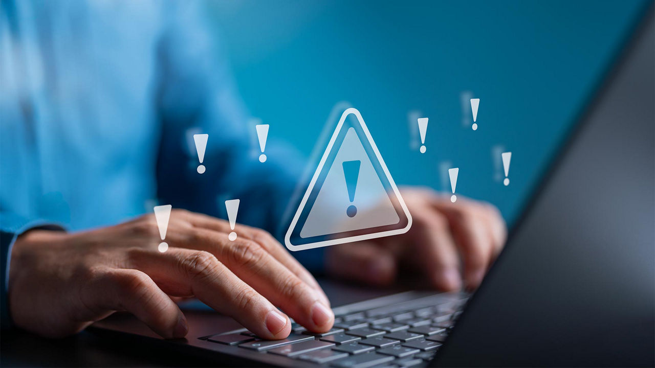 person getting security alerts on laptop